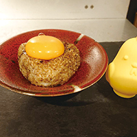 TKG (tamago kake gohan: Raw egg on a grilled rice ball)